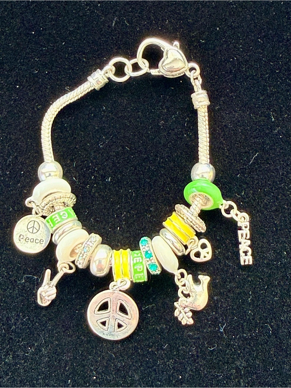 Silver Peace Charm Bracelet with Green & Yellow Accents